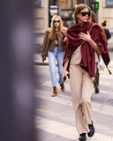 CASHMERE CAPE WITH LEATHER TASSELS